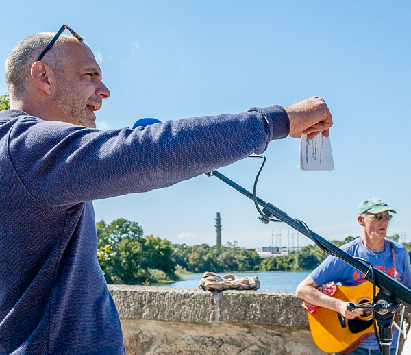 Doug Thompson, Salem activist, addresses protesters.