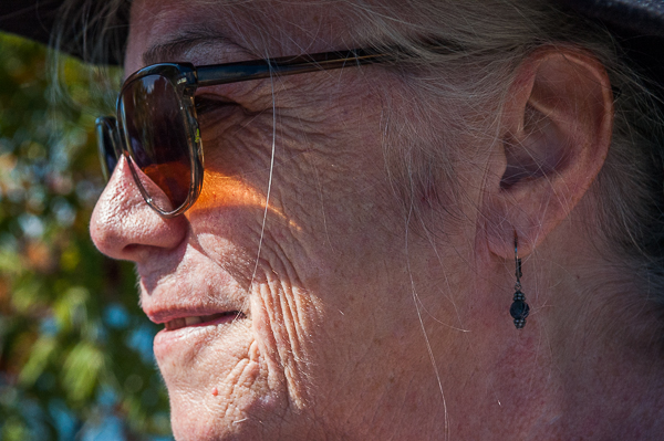 Susan "Sudi" Smoller listening to speakers.